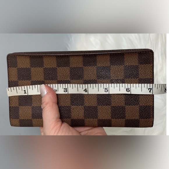100% authentic Louis Vuitton Damier Ebene (DE) long vertical wallet organizer. - Picture 14 of 15